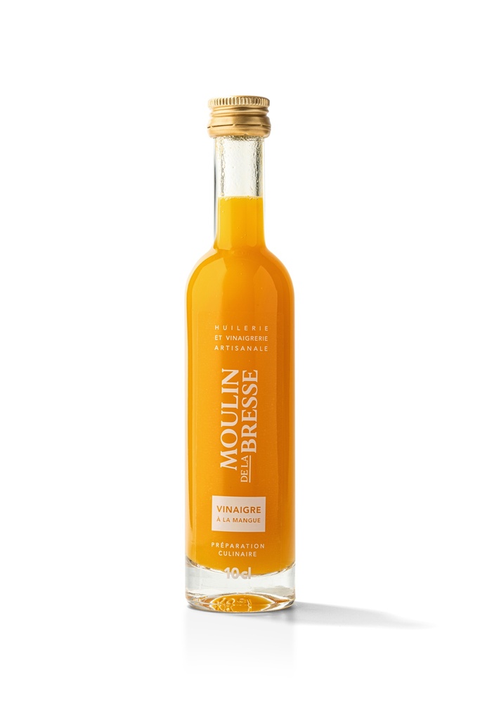 vinaigre à la pulpe de mangue en bouteille